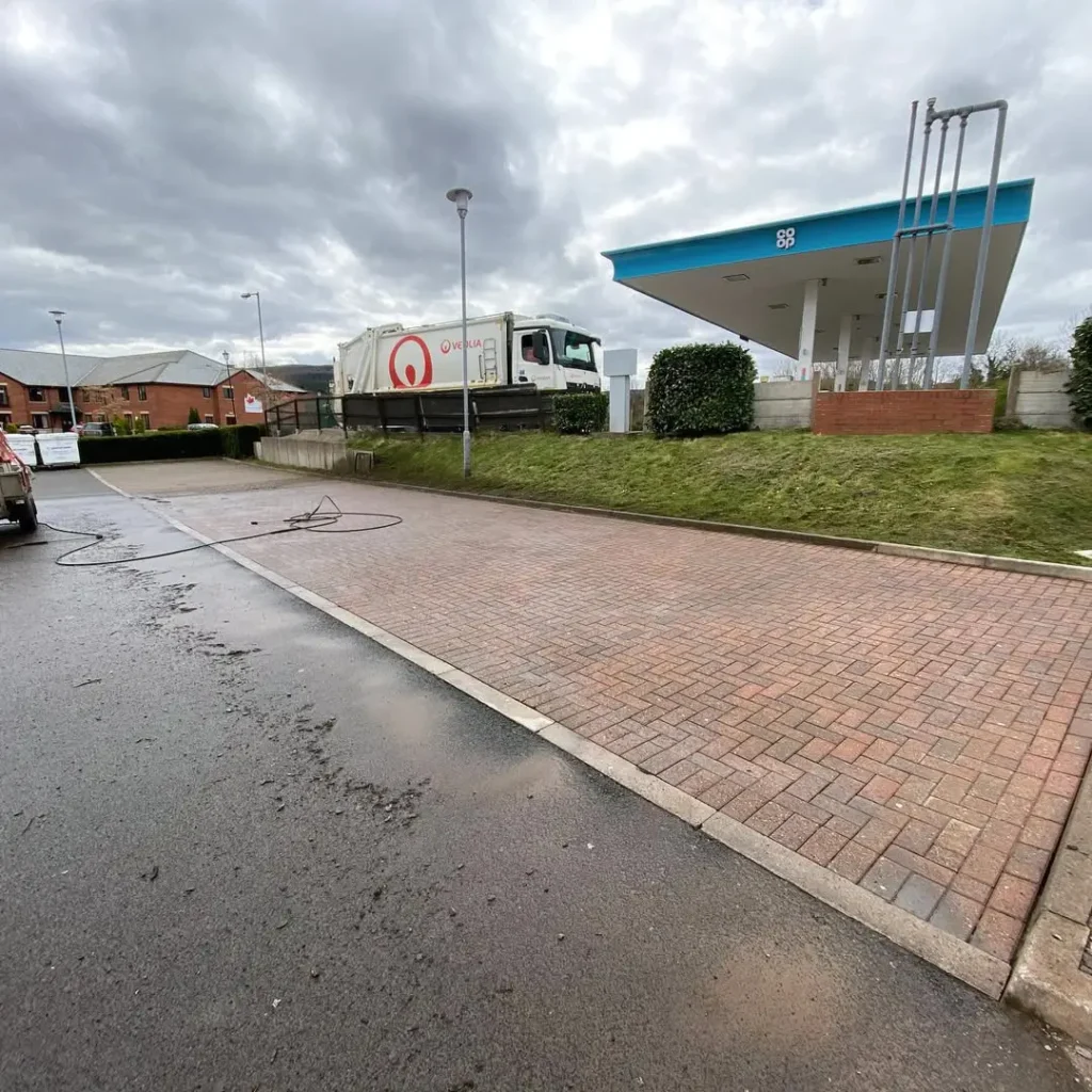 Freshly pressure-washed and re-sanded block paving outside a Subway store in Guisborough, restored by Roundhouse UK’s professional cleaning team.