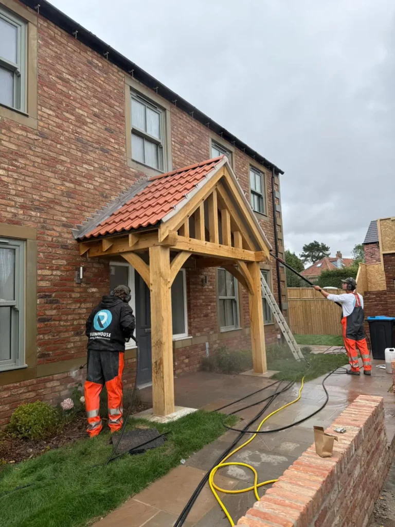 Roundhouse UK specialist cleaning the exterior of a new-build property with solar panels at Sheriff Hutton, built by Wharfedale Homes.